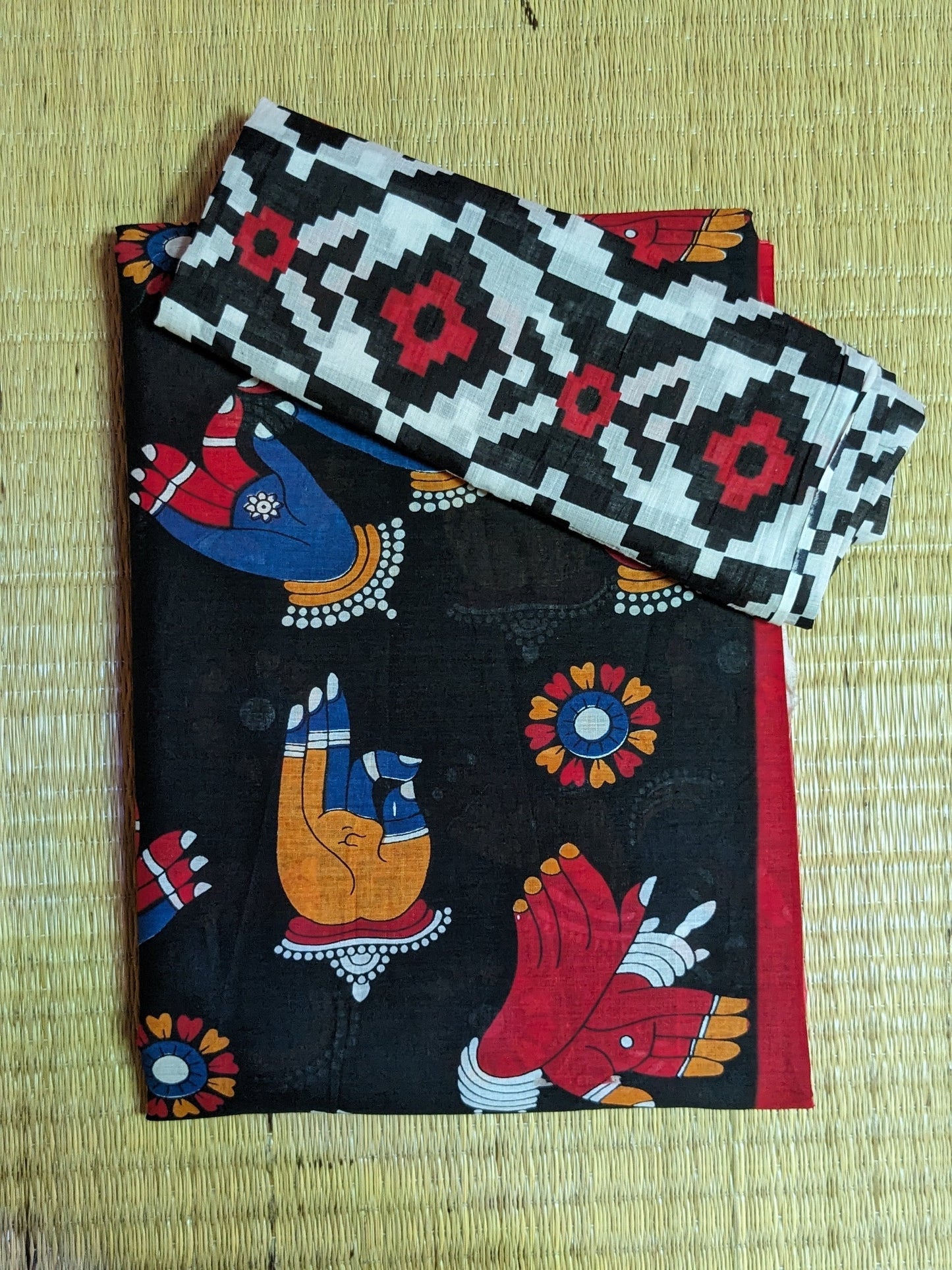 Pre order Pretty black body with Mudras printed pure cotton saree