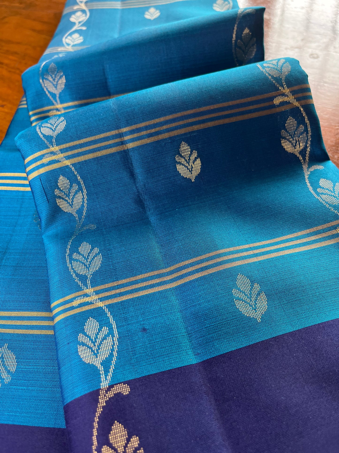 New arrival: Handloom Double Warp beautiful sky blue with navy blue triple striped floral Soft Silk Saree