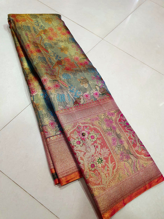 Beautiful Kanchipuram silk meenakari woven intricate design with 10" border at the lower end and 4" border at the top