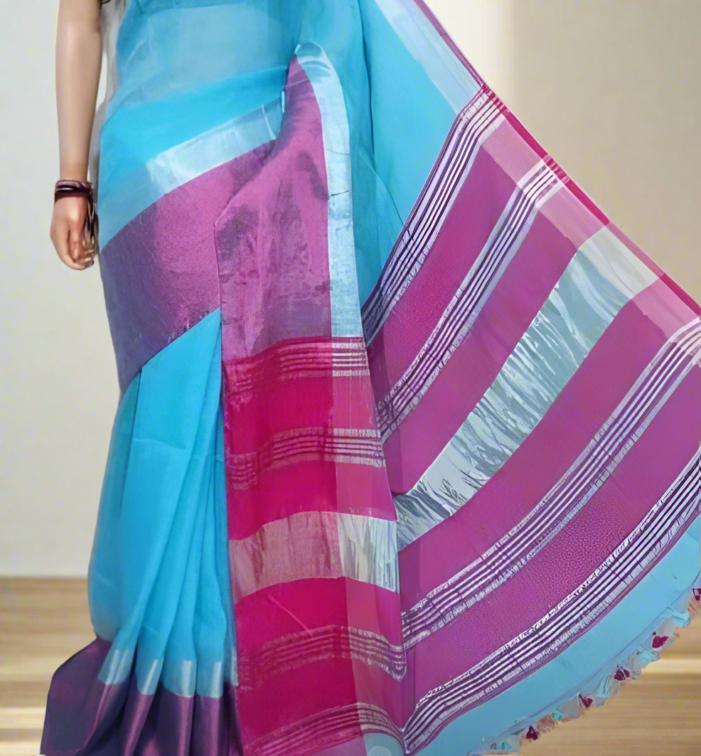 Sky blue linen saree with dark pink pallu