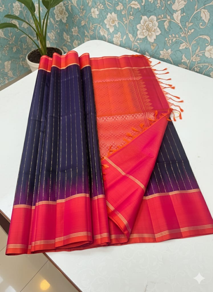 Pure Kanchipuram handloom soft silk 
Gold zari buttas (rain drops) all over saree and both side plain border korvai style