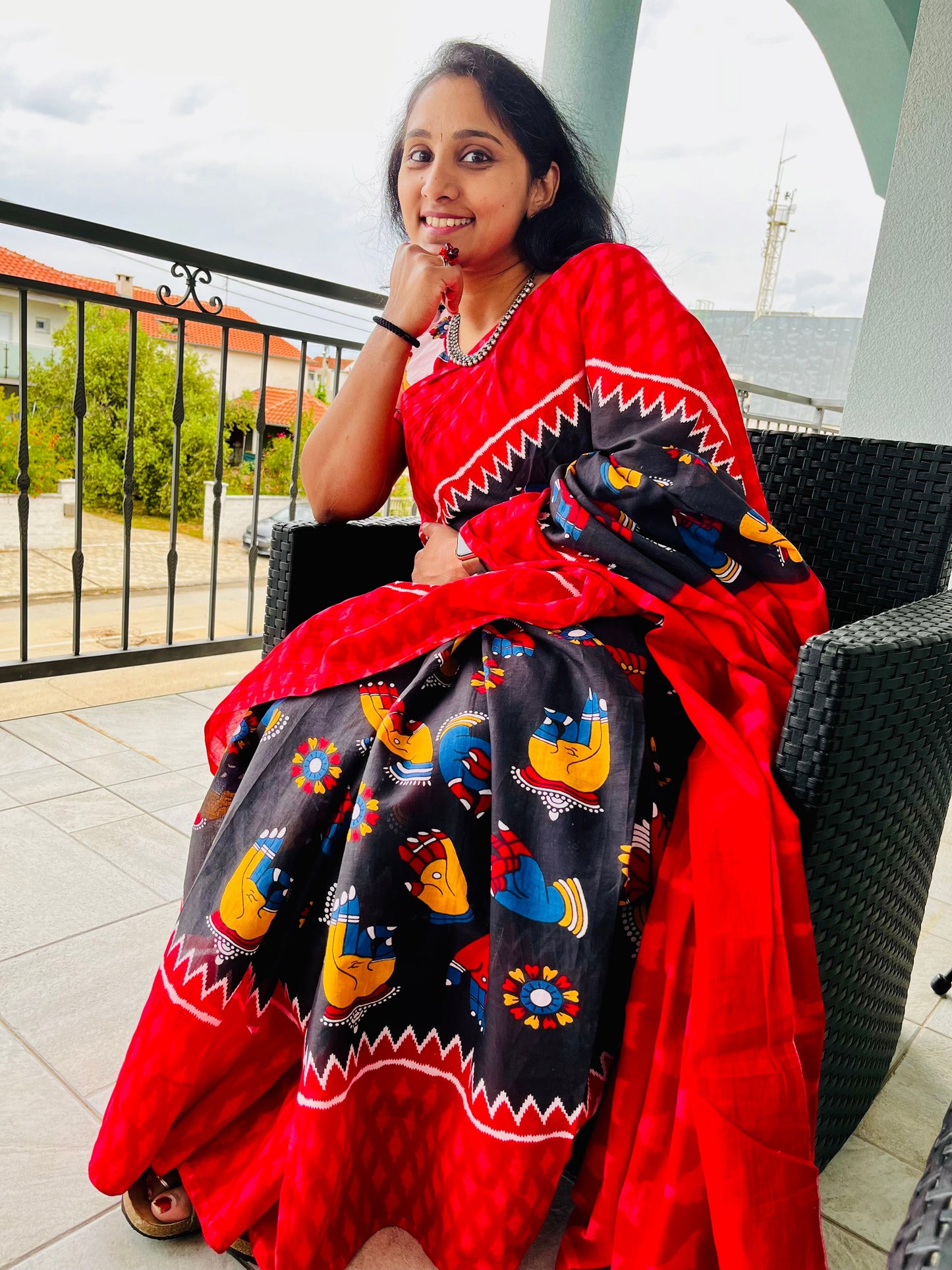 Pretty black body with Mudras printed pure cotton saree