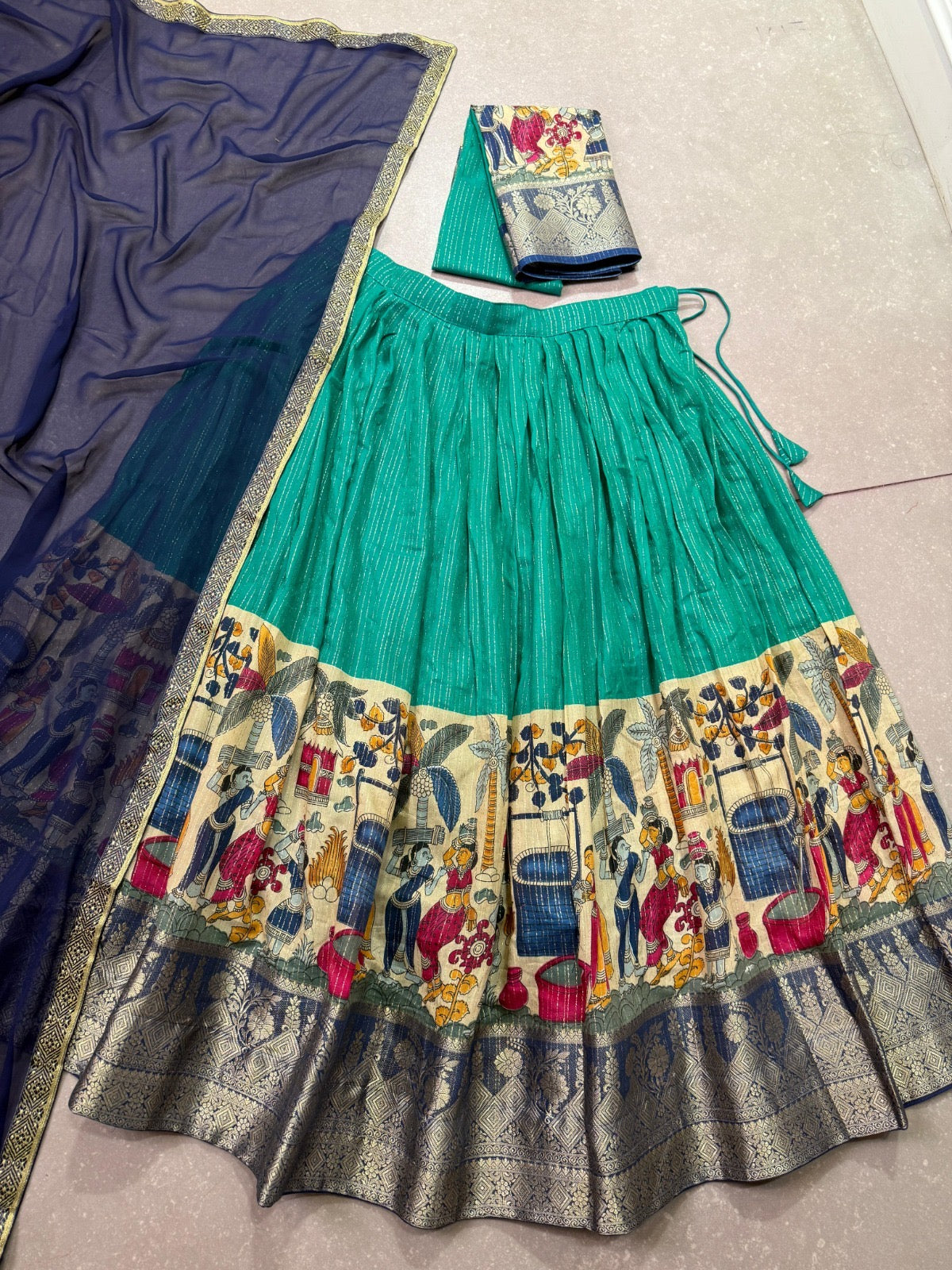NITRIYA catalogue Fancy Semi stitched  Poly Chanderi lehenga, designed with delicate Zari stripes and enhanced with Kalamkari prints - New arrival ready for dispatch
