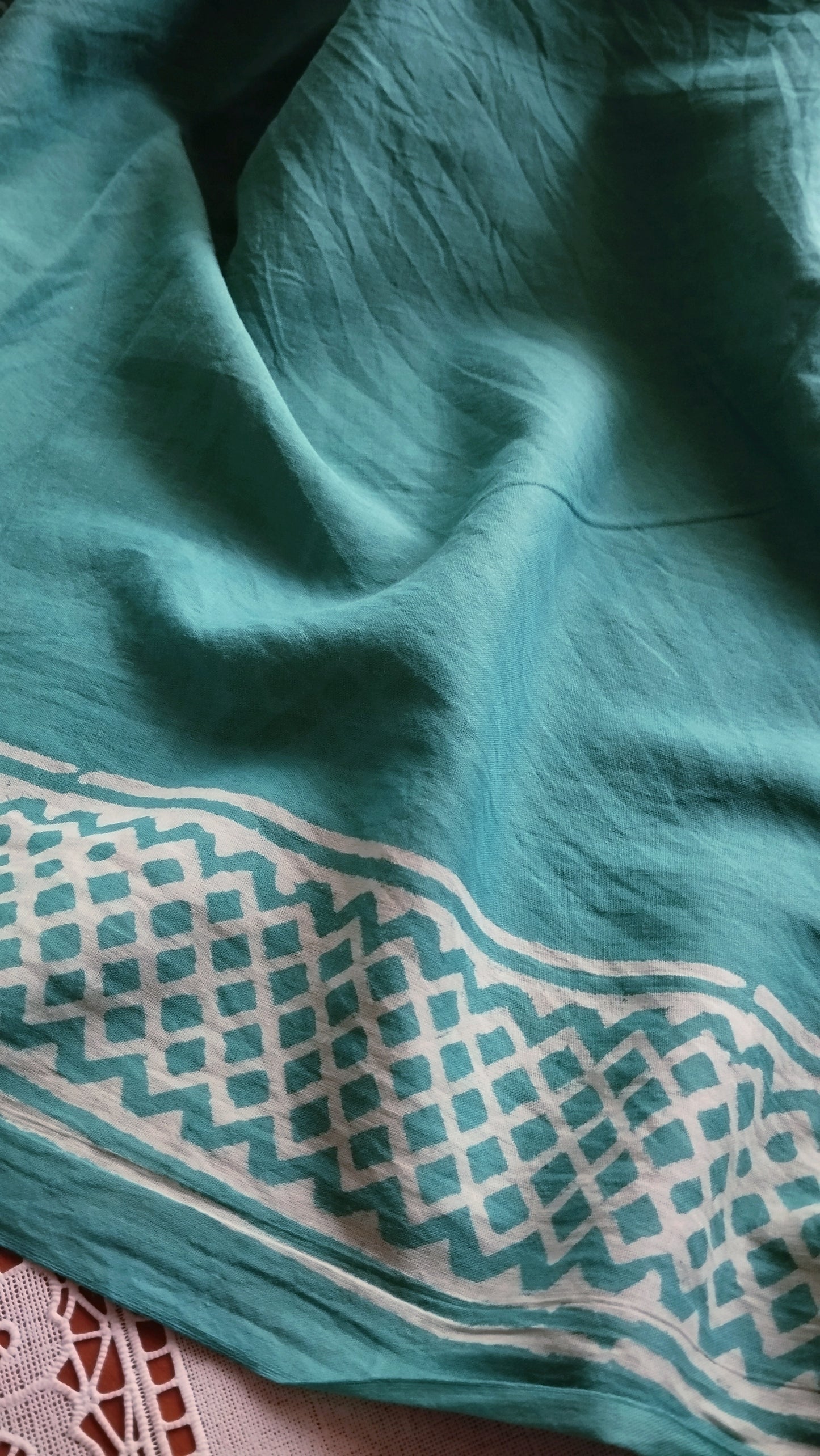 Soft hand printed premium teal green mulmul cotton saree with blouse