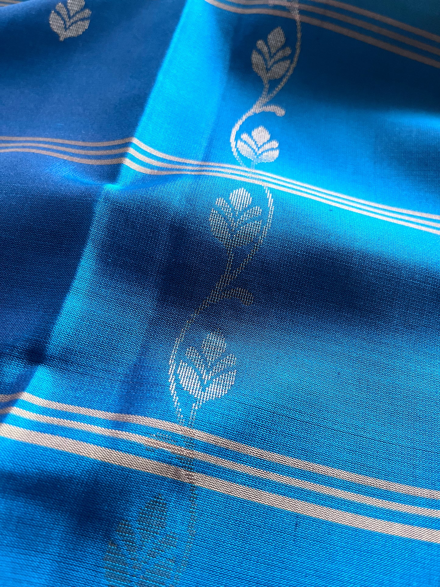 New arrival: Handloom Double Warp beautiful sky blue with navy blue triple striped floral Soft Silk Saree