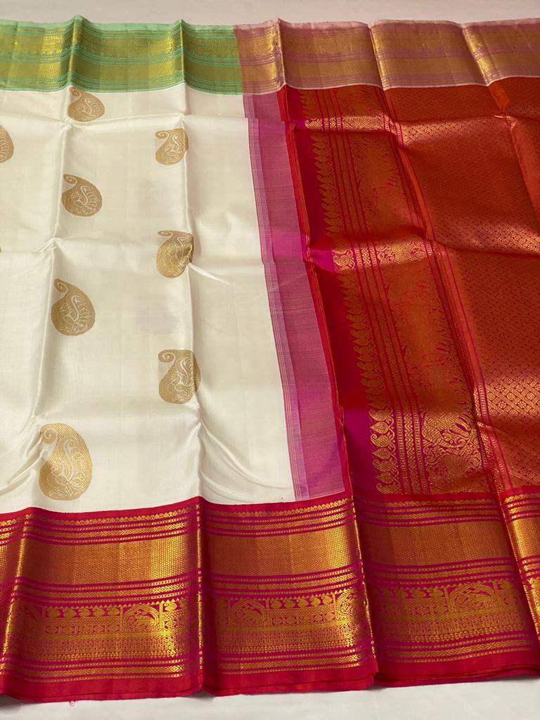 Ganga Jamuna Peacock Motif Border Off White Plain Kanchipuram Silk Sar –  Sundari Silks