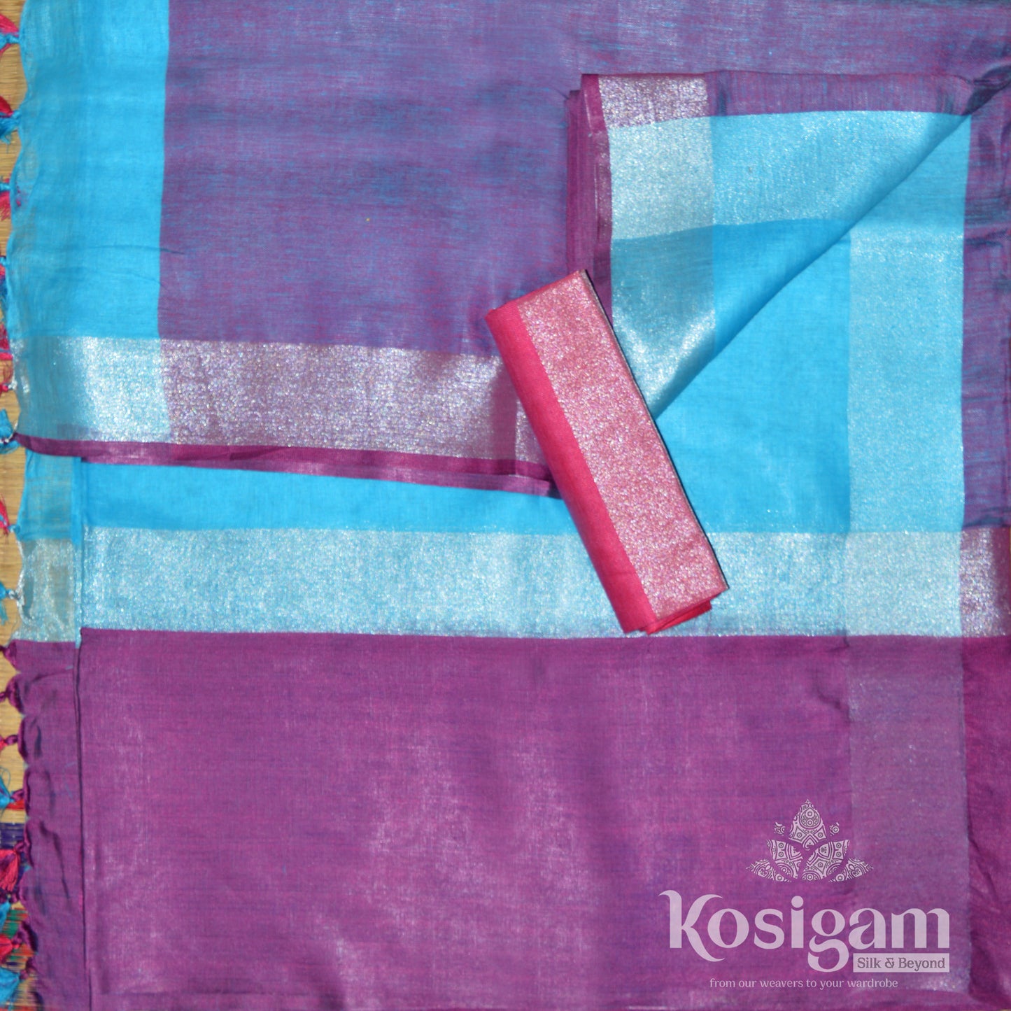 Sky blue linen saree with dark pink pallu