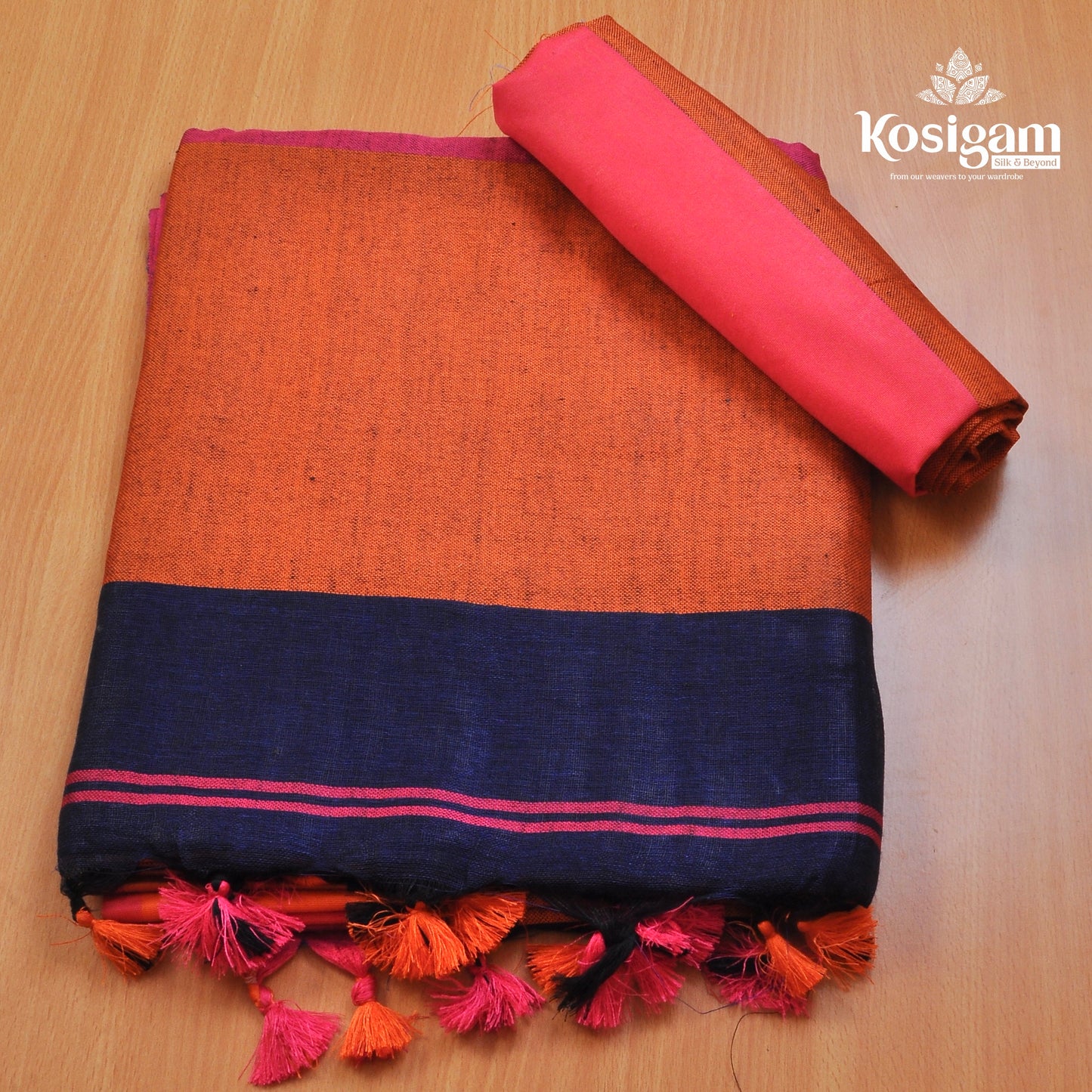 Blue linen saree with orange pallu and border