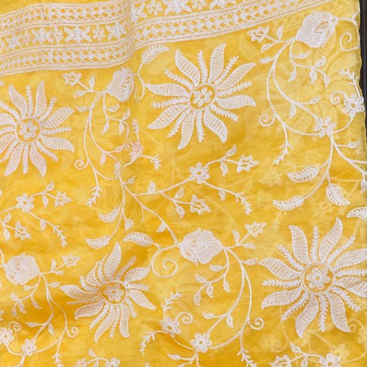 Yellow organza saree with chikkankari floral work