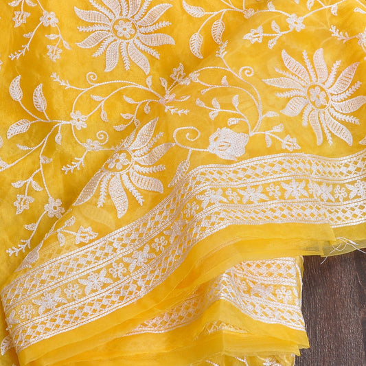 Yellow organza saree with chikkankari floral work