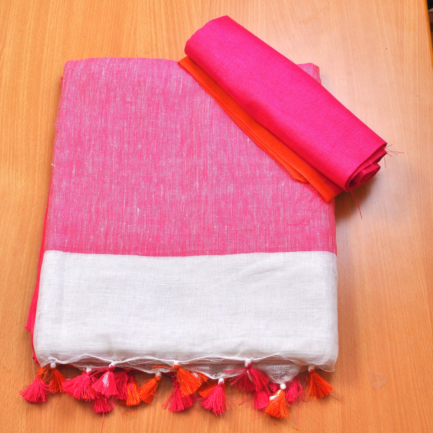 White with orange and pink linen saree;