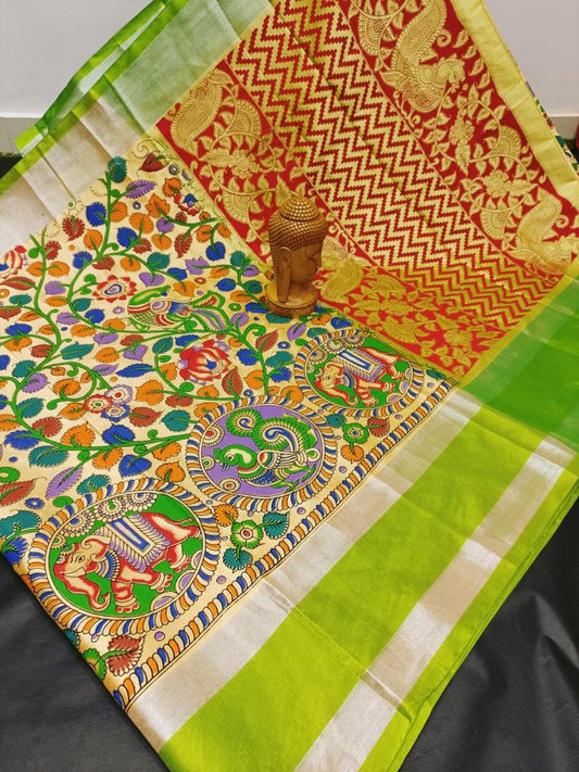 Beige with green Tripura Kalamkari printed saree