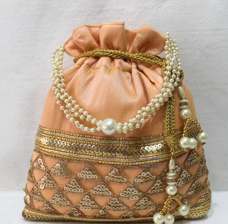 Peach and gold sequins work Potli with pearl beads