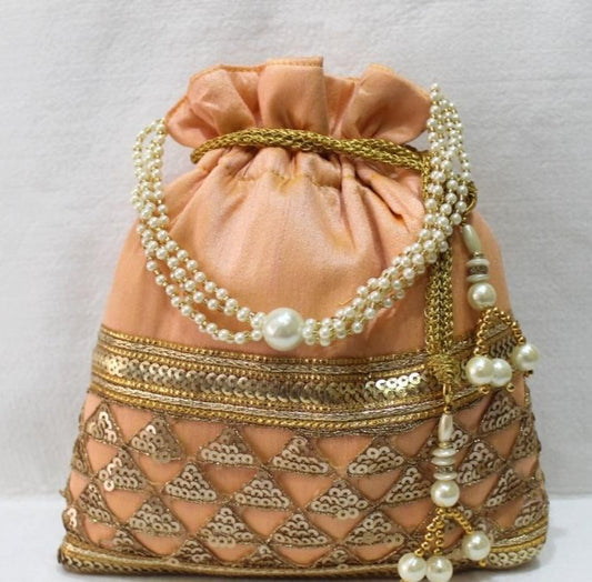 Peach and gold sequins work Potli with pearl beads