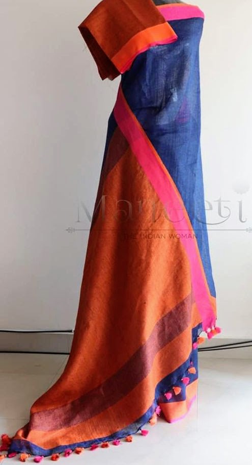 Blue linen saree with orange pallu and border